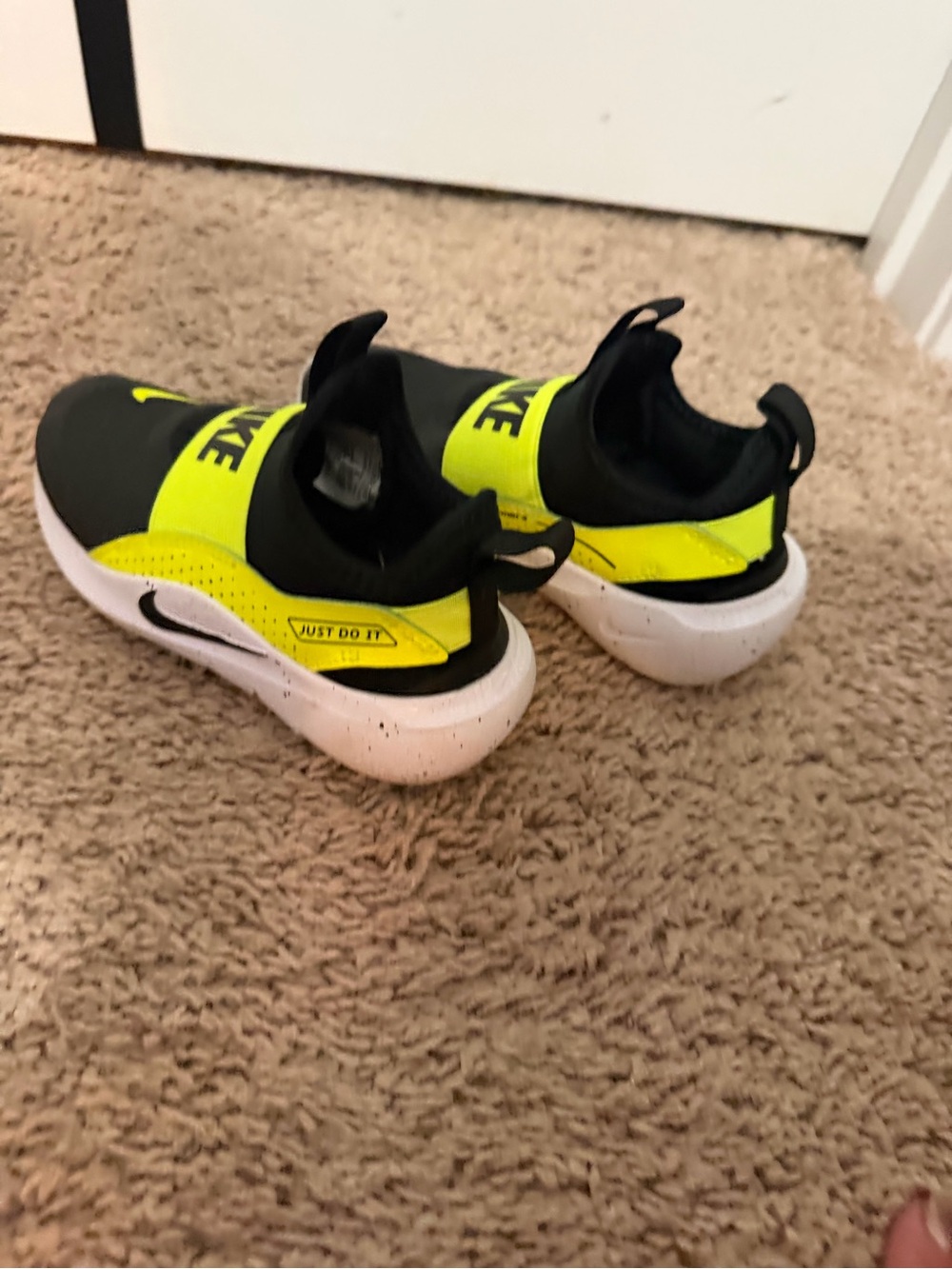 Nike Kids Slip-On Sneaker in Black and Neon Yellow